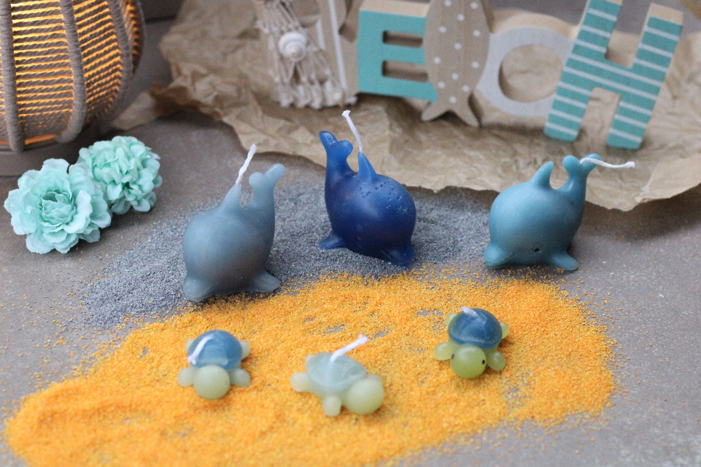 Kerze, die aussieht wie ein liegender Delfin