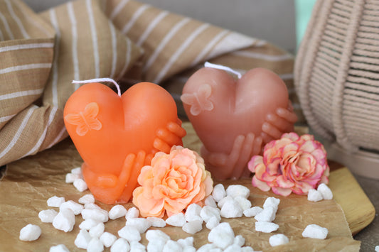 Gehaltene Herz Kerze